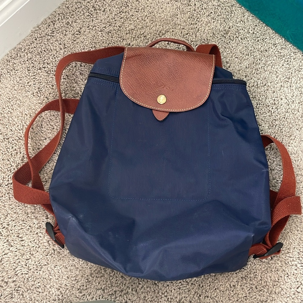 Longchamp mini backpack navy. A few light marks on bottom.